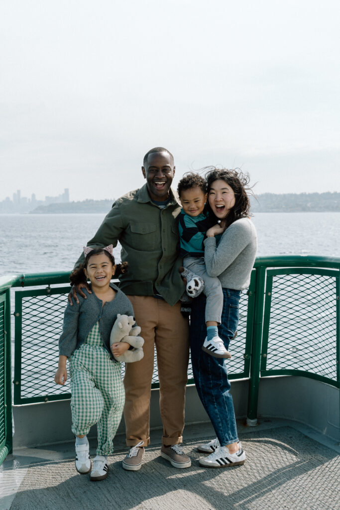A family on the Seattle ferry smiling